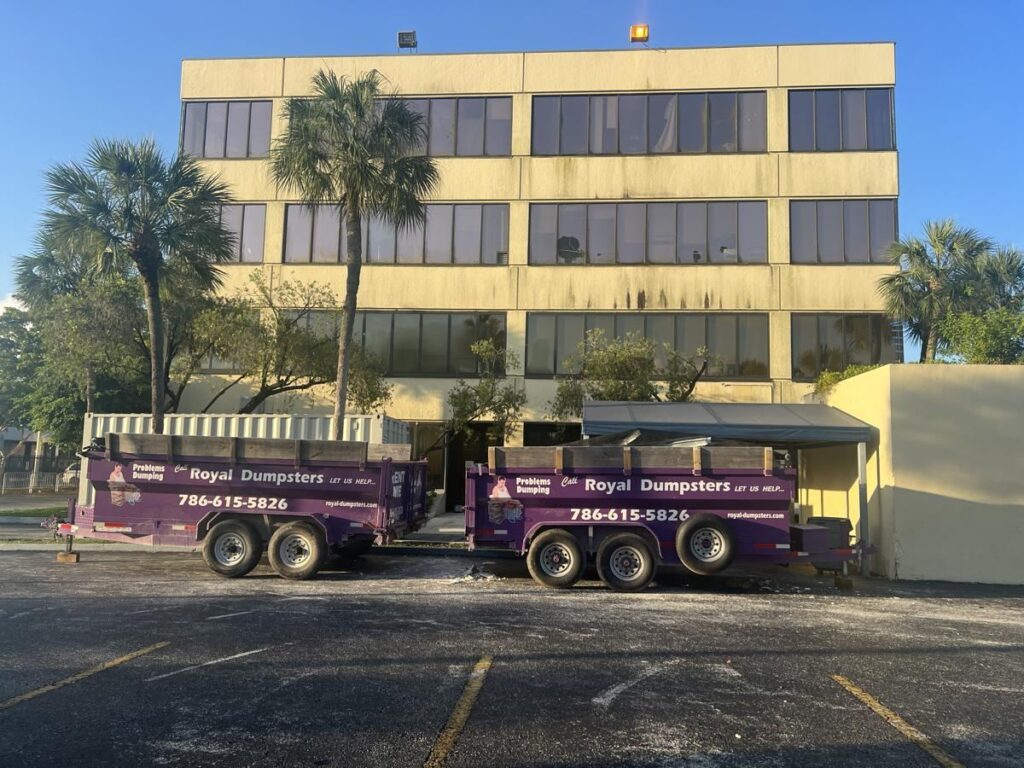 Two Royal Dumpsters dumpsters at a commercial office building cleanout in Miami Gardens, FL