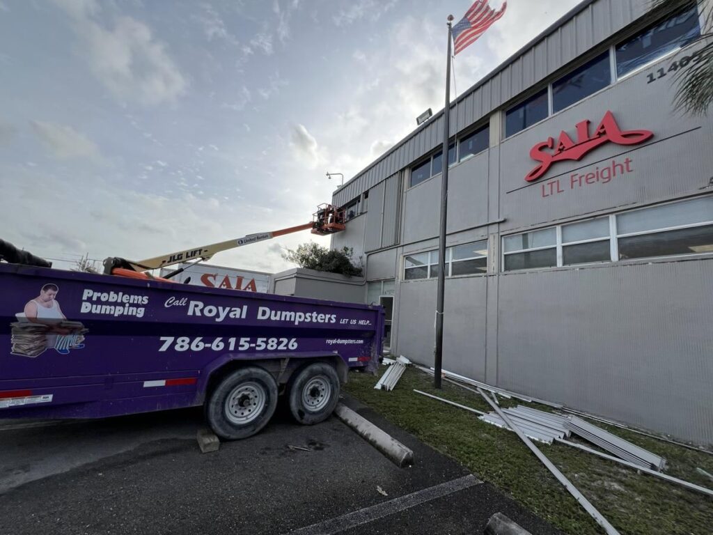 Royal Dumpsters commercial dumpster at a contractor's factory project in Opa-locka, FL