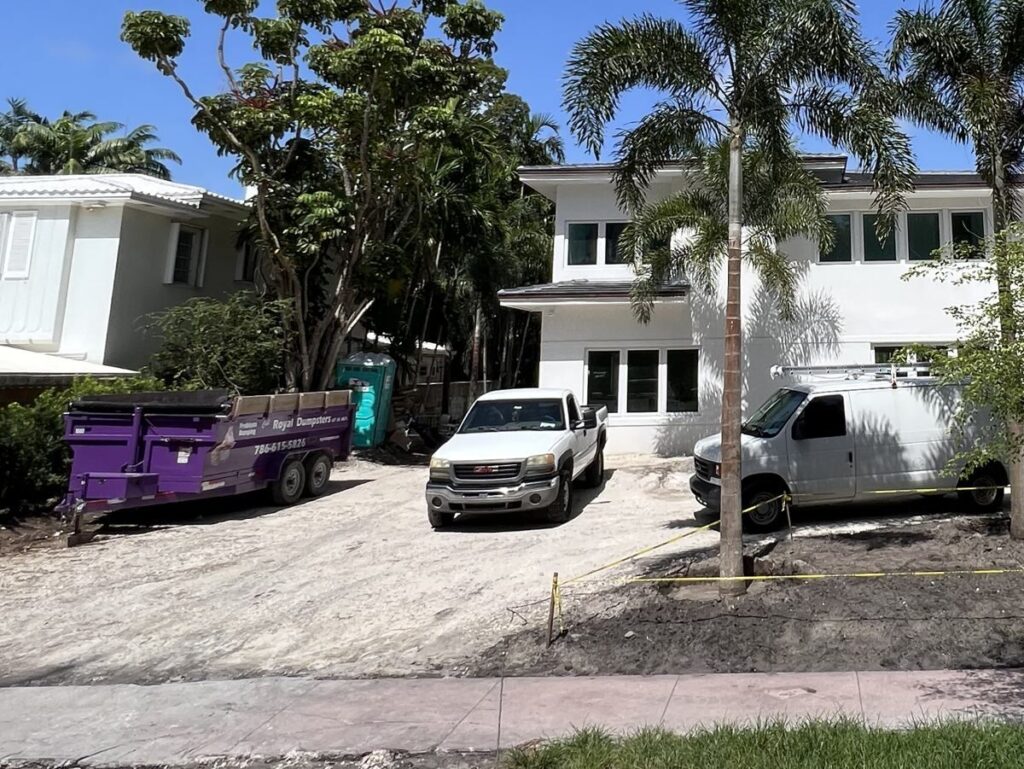 Royal Dumpsters dumpster at a new construction home in Miami Beach, FL