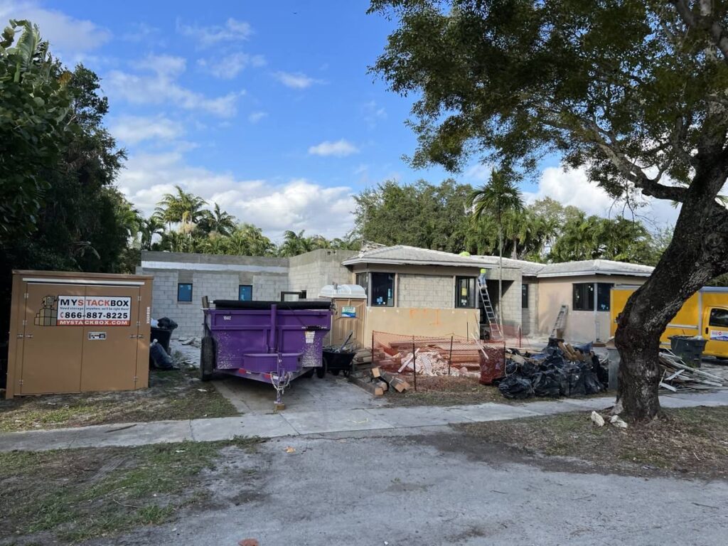 Purple Royal Dumpsters dumpster at a home renovation in North Miami, FL